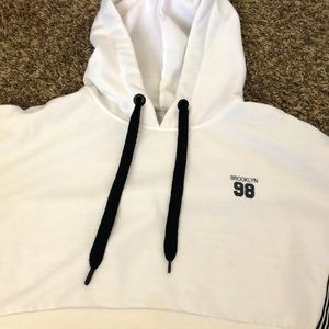 A cropped Brooklyn hoodie